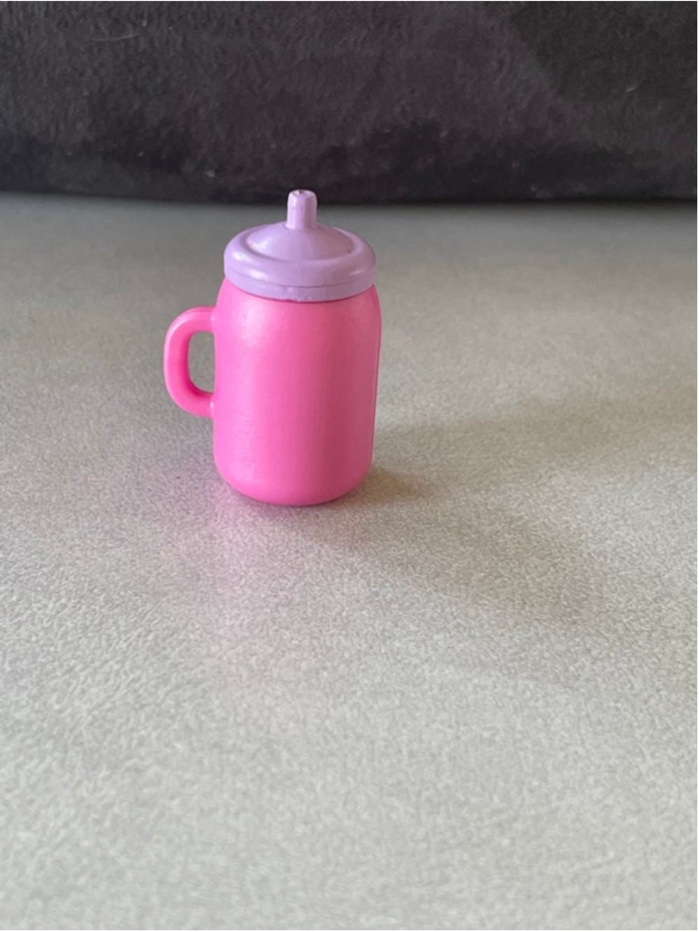 miniature toy bottle accessory from the L.O.L. Surprise! doll collections